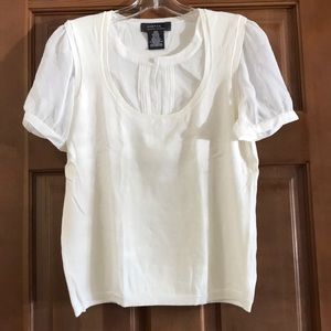 Sweater and blouse in one.